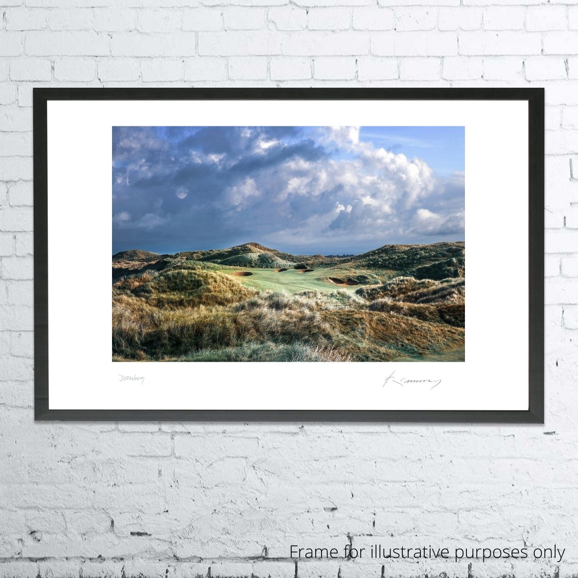 A framed photograph of Doonbeg as shot by Kevin Murray. 